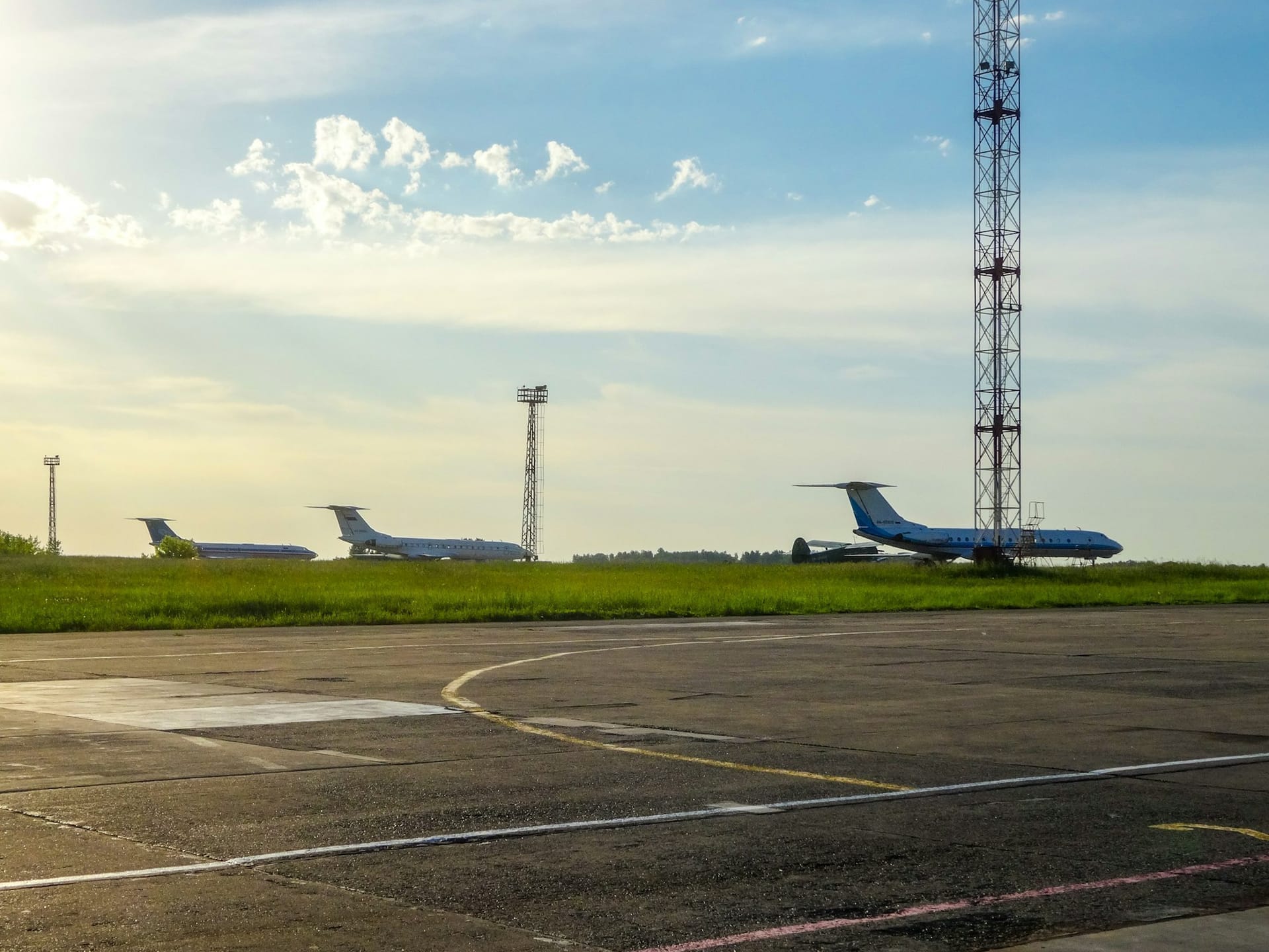 Private jets parked on airport ramp