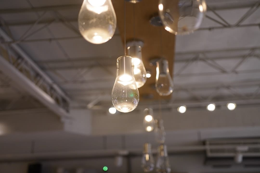 Corporate product launch event in aircraft hangar with dramatic lighting