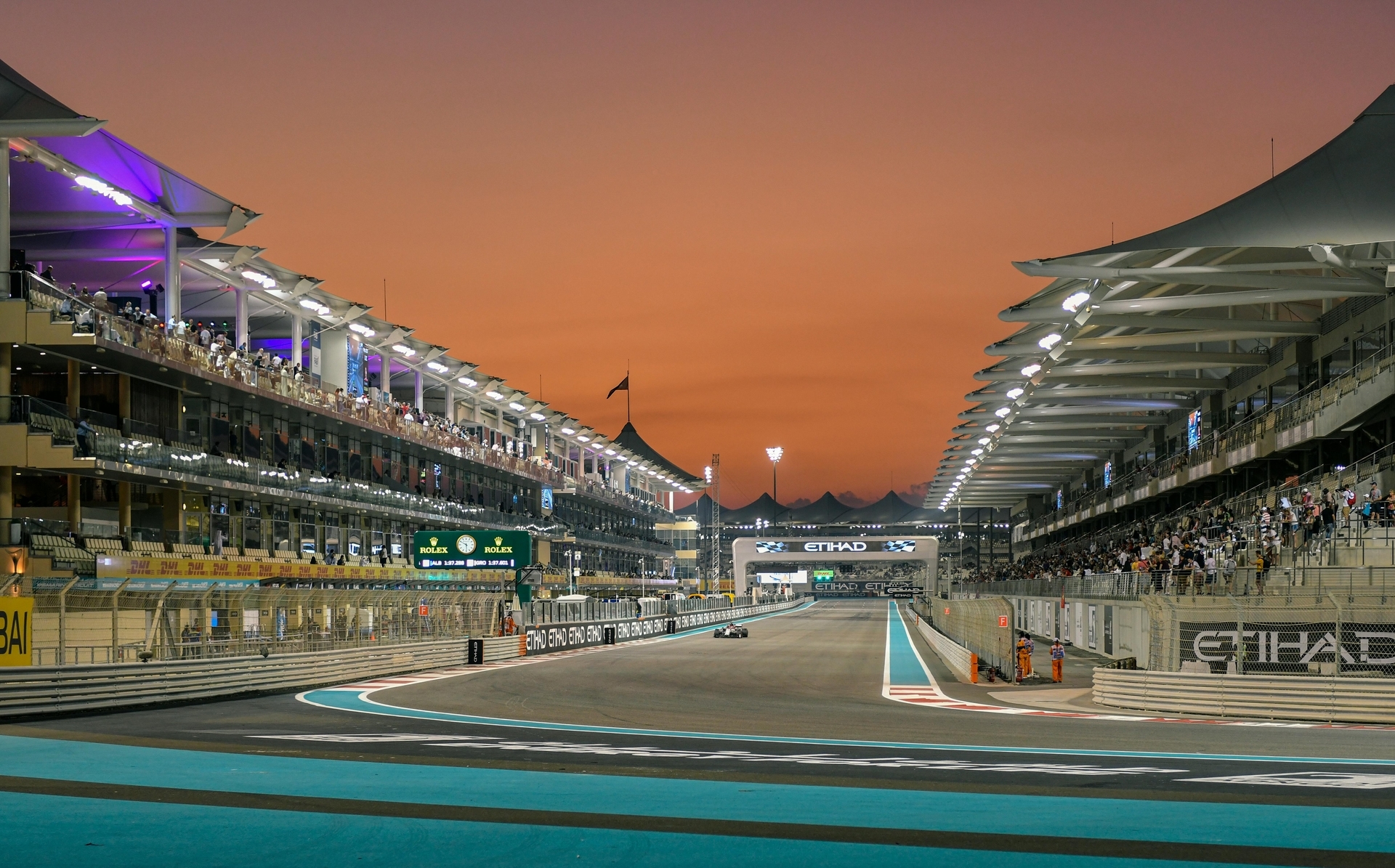 Formula 1 race at Yas Marina Circuit during sunset
