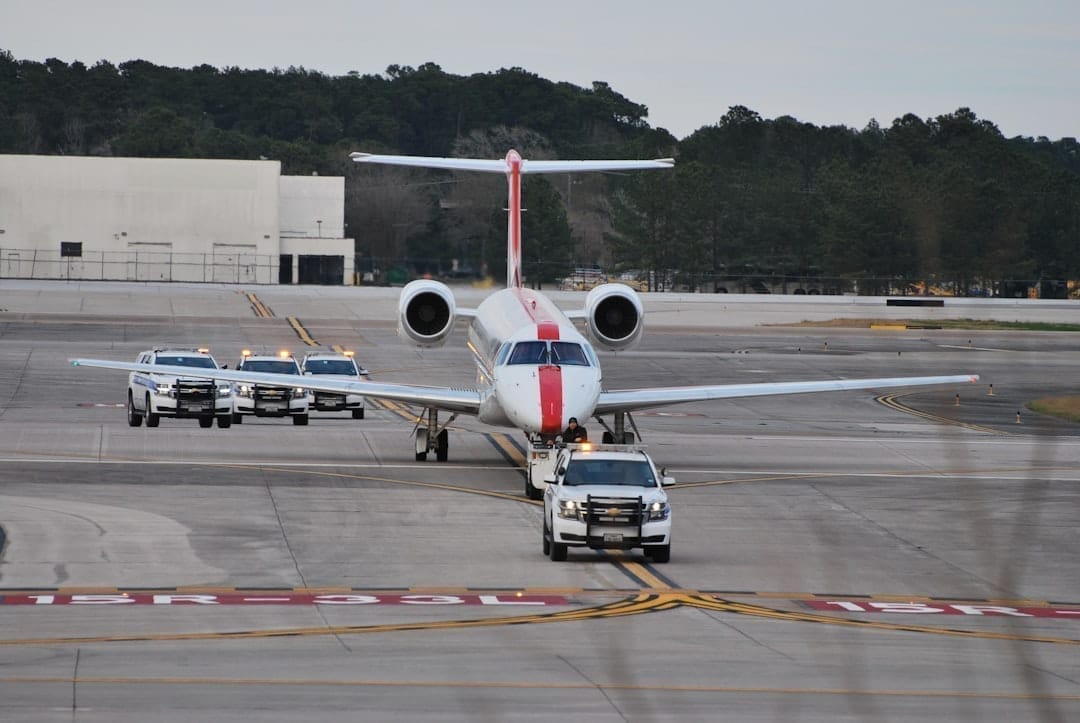 Line service technician conducting aircraft ground handling operations