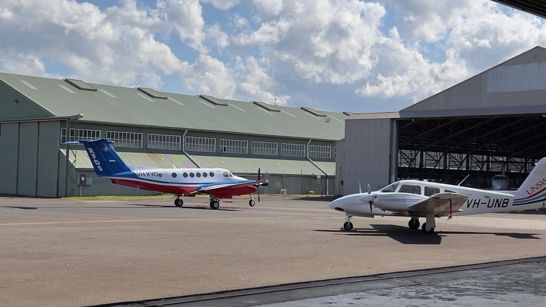 Modern midsize jets in hangar