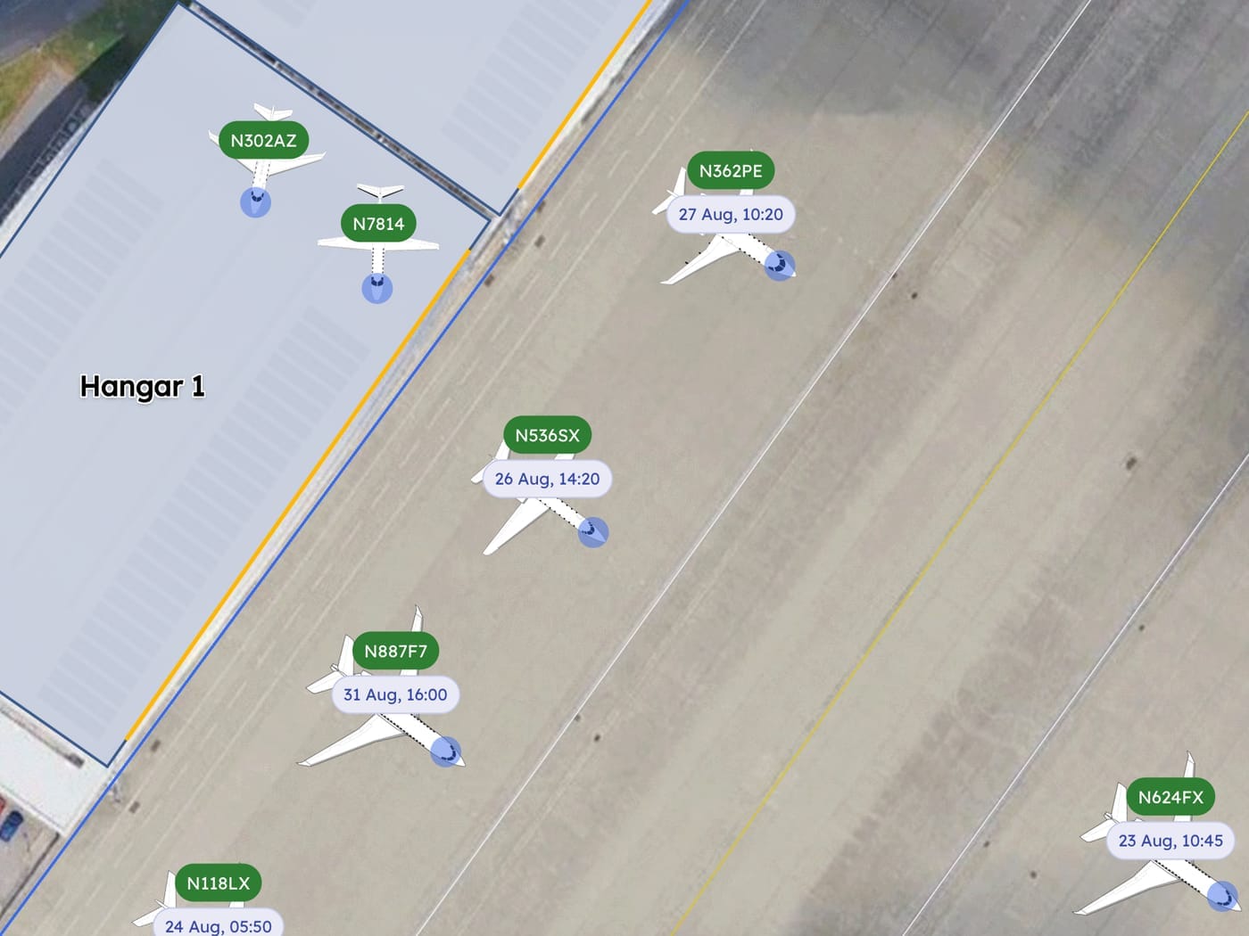 AirPlx Base View showing Hangar 1 and its main ramp on a satellite image, with every aircraft drawn in the position it is parked in, each labeled with its tail number and the time it was last moved
