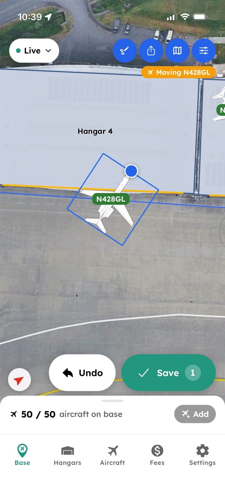 Repositioning an aircraft in AirPlx on a phone: N428GL is selected inside Hangar 4 with a handle to swing it round, a Moving N428GL banner above it, and Undo and Save at the bottom